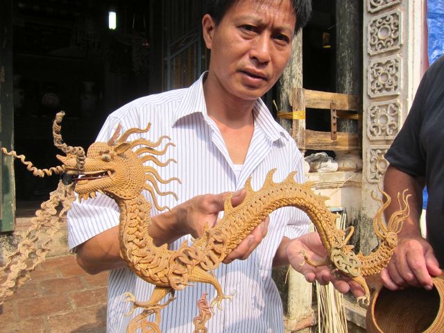 Craft Master Hac Showing his Masterpiece in Vietnam