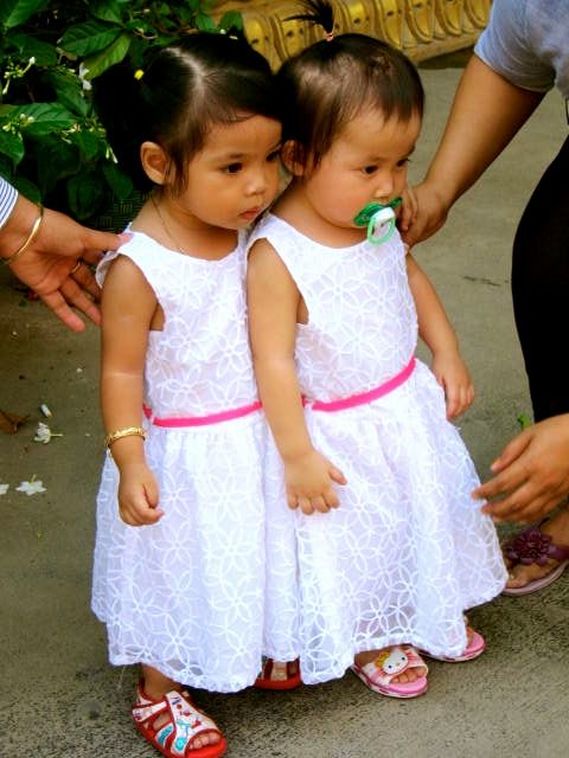 Two Little Girls at the Pagoda on Khmer New Year